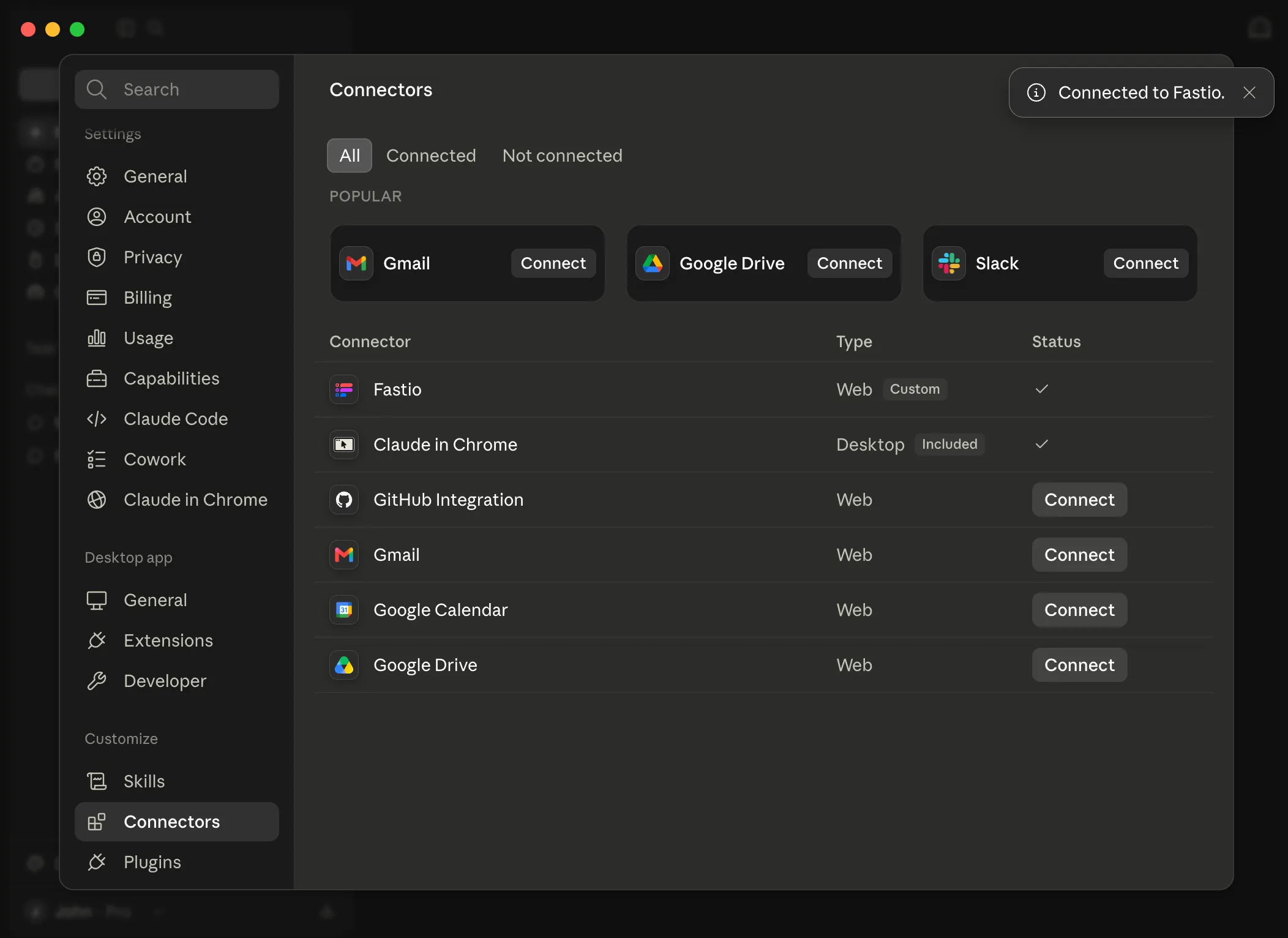 Claude Desktop Connectors page showing Fastio connected with checkmark and toast notification
